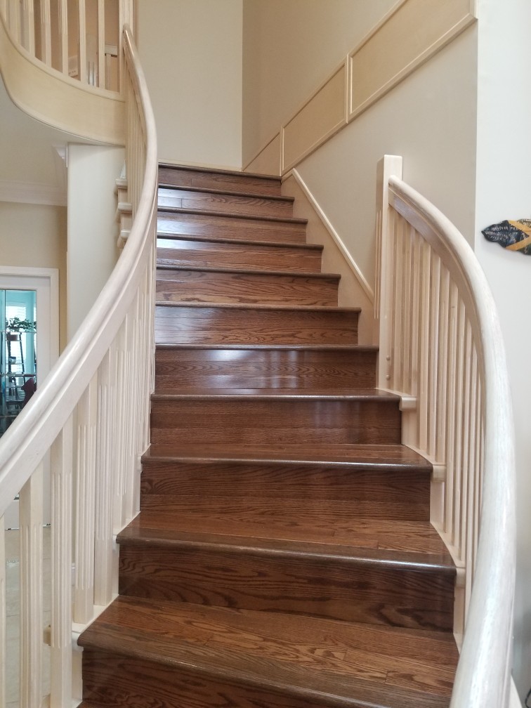 Stairs that were sanded and refinished with custom walnut stain